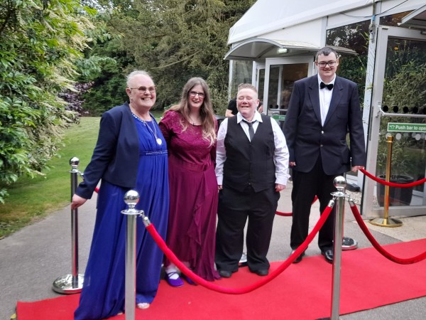 Maria with customers Zoe, Rachael and Braedon on the red carpet