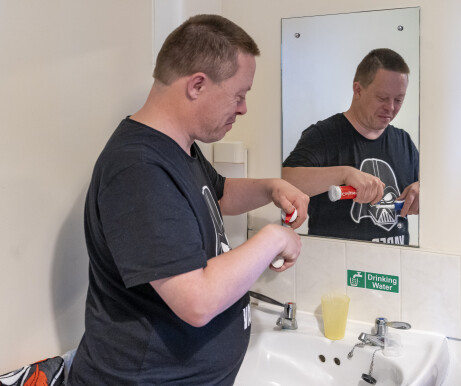 Person brushing teeth